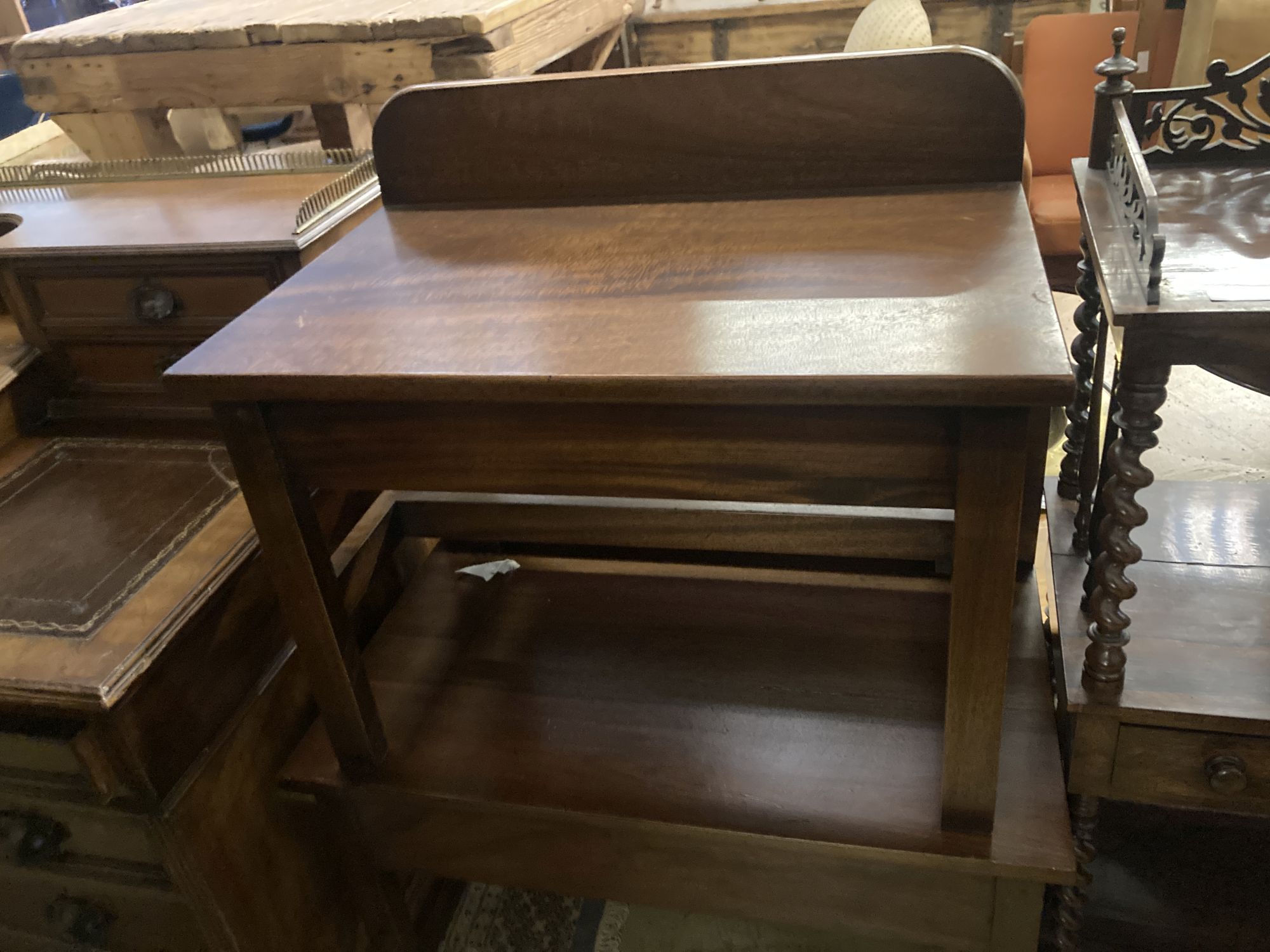 A near pair of mahogany luggage racks, larger 76 x 44cm height 66cm